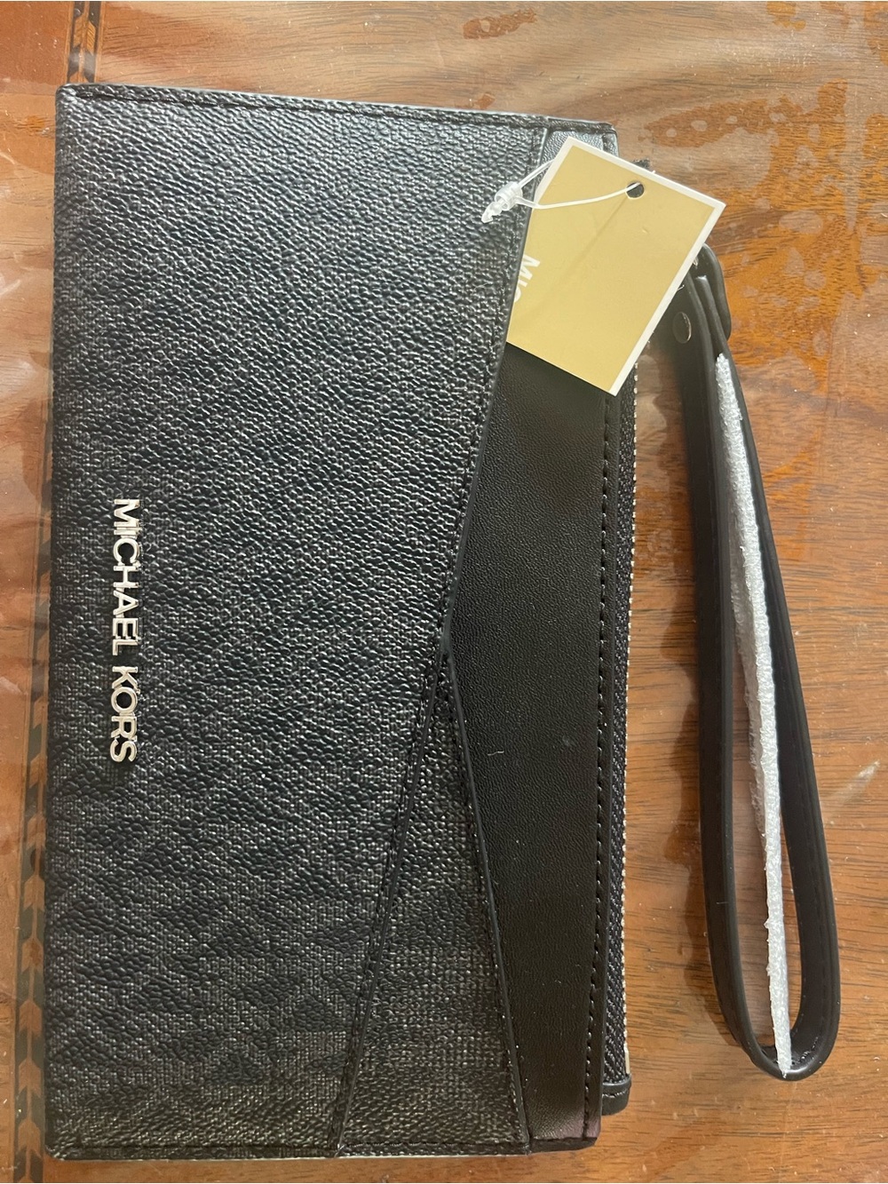 Michael Kors Black Textured Leather Slim Wristlet with Silver  Accent